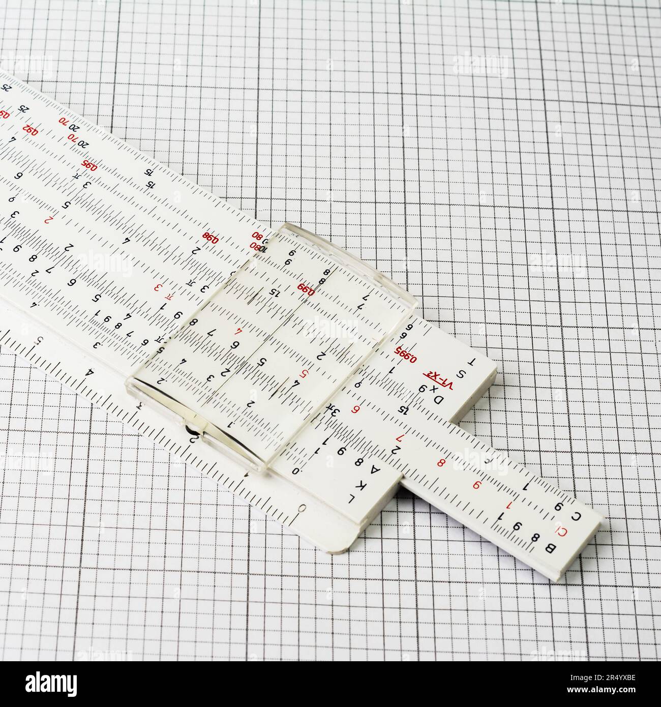 Old slide rule on plotting paper Stock Photo Alamy