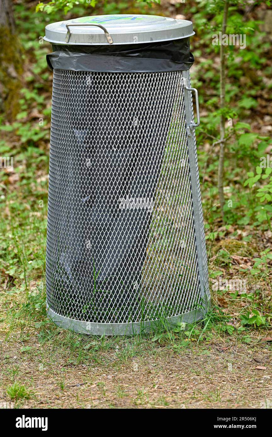 The big black plastic bags with garbage waste in forest Stock Photo - Alamy