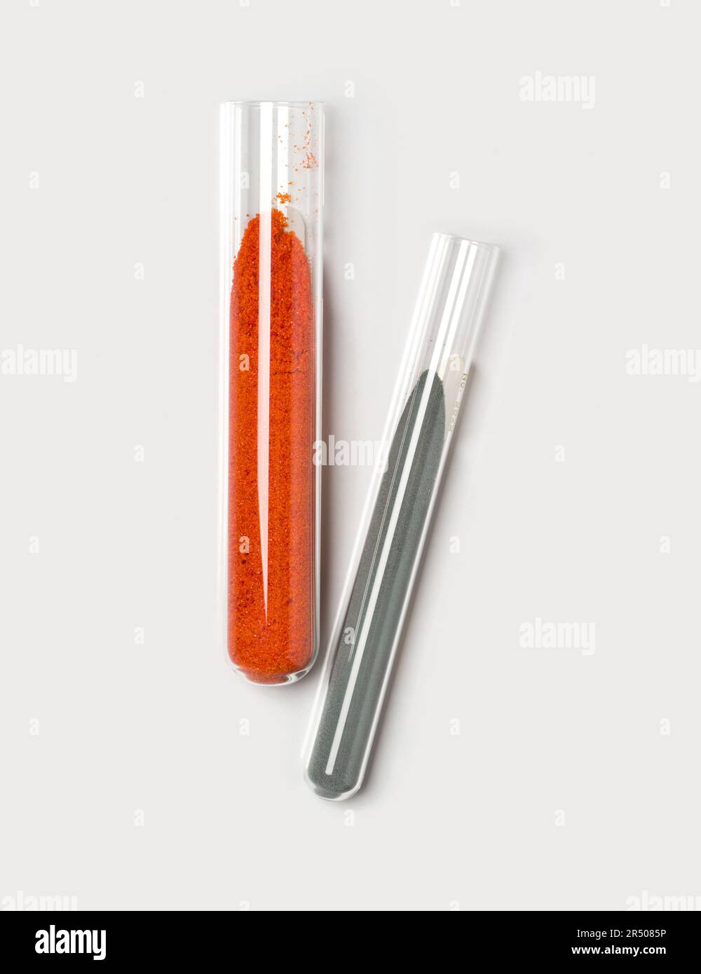 Potassium Ferricyanide and Zinc Powder in test tube. Closeup chemical