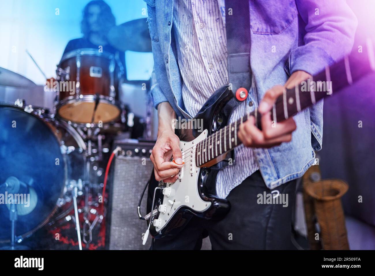 Guitar, band and man hands at music festival show playing rock with