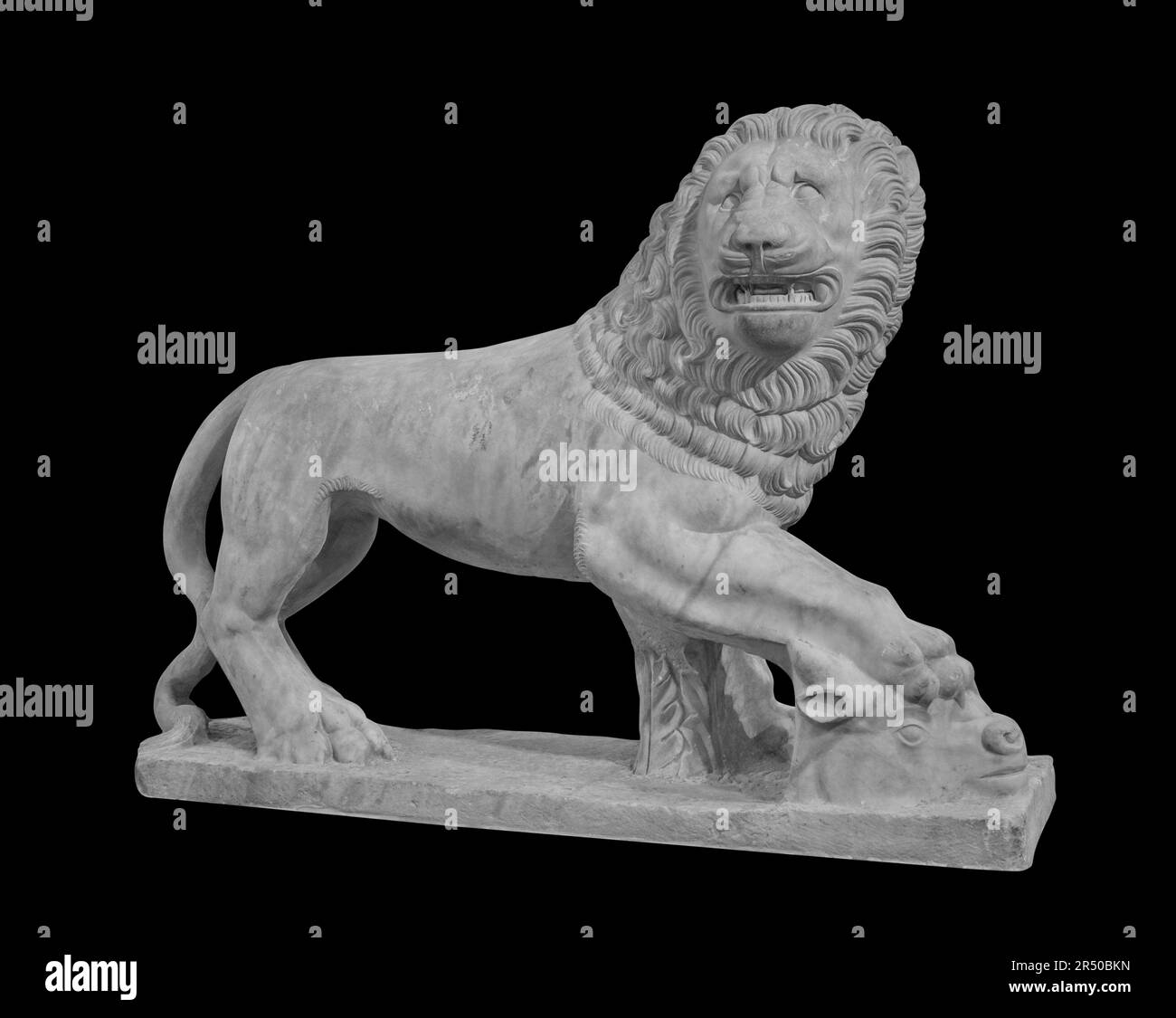 Stone lion statue. Ancient sculpture art masterpiece isolated photo