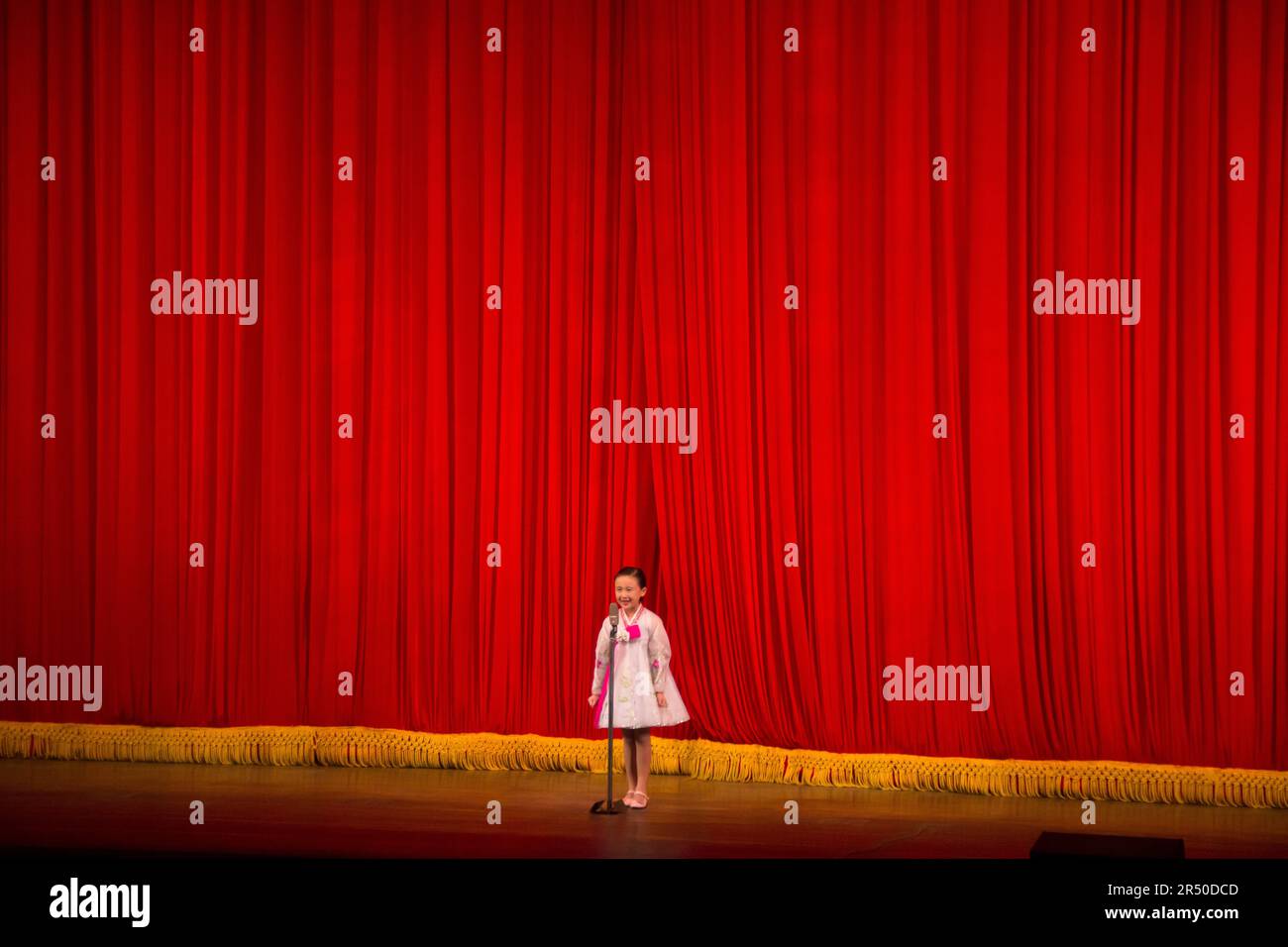 kids performing a show at Mangyongdae School Children's Palace in Pyongyang in North Korea Stock Photo