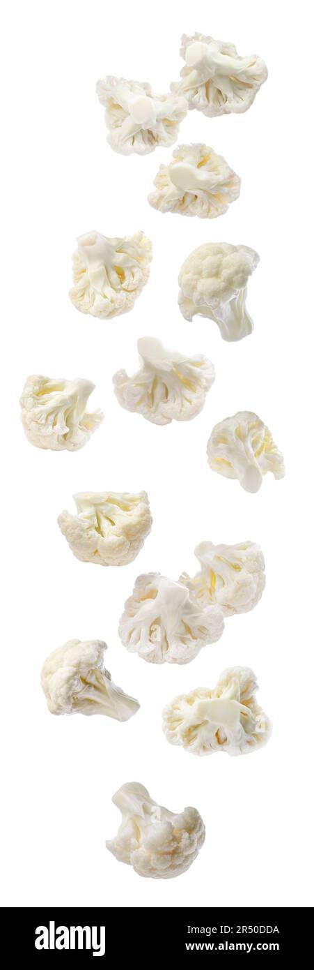 Many fresh cauliflower florets falling on white background Stock Photo