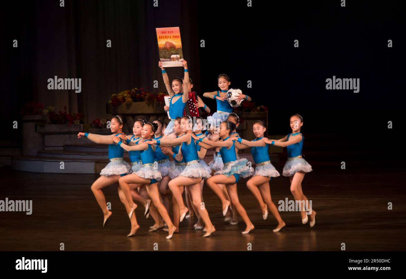 kids performing a show at Mangyongdae School Children's Palace in Pyongyang in North Korea Stock Photo