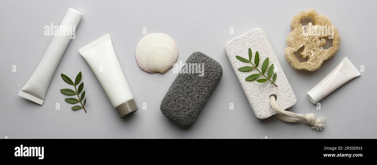 Flat lay composition with spa products on light grey background. Banner ...