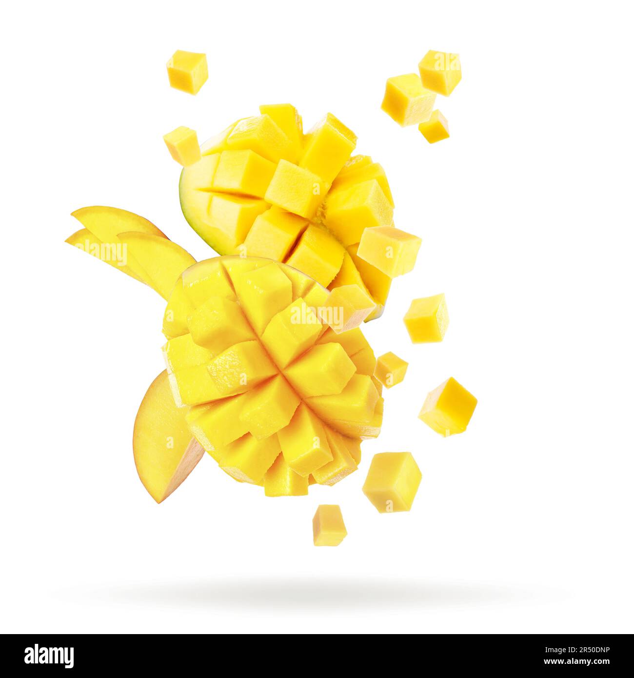 Delicious cut mango fruits falling on white background Stock Photo - Alamy