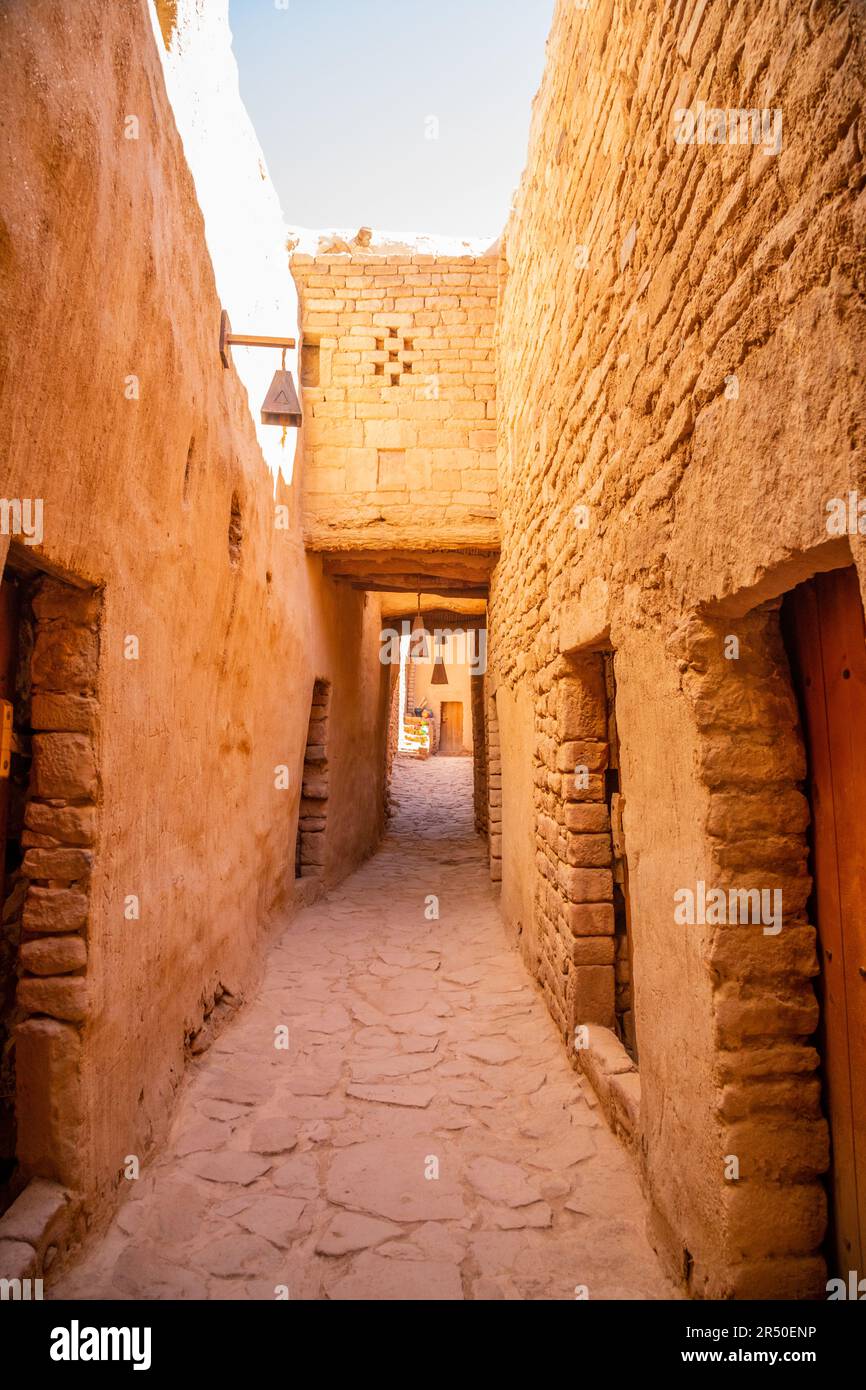 Al Ula old town street between mud bricked walls , Saudi Arabia Stock