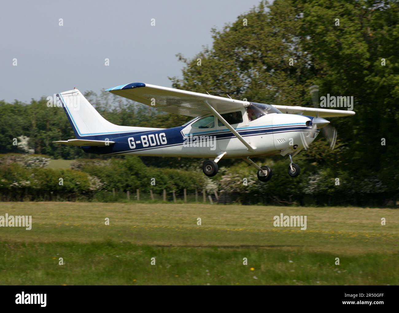 A Reims-Cessna F182P Skylane II departing Headcorn Aerodrome Kent England Stock Photo