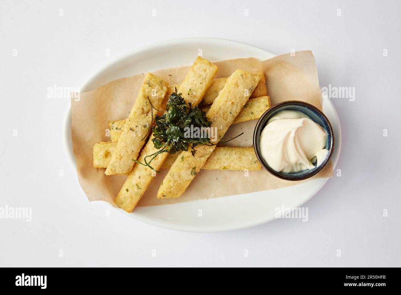 Deepfried polenta strips with an aioli dip Stock Photo Alamy