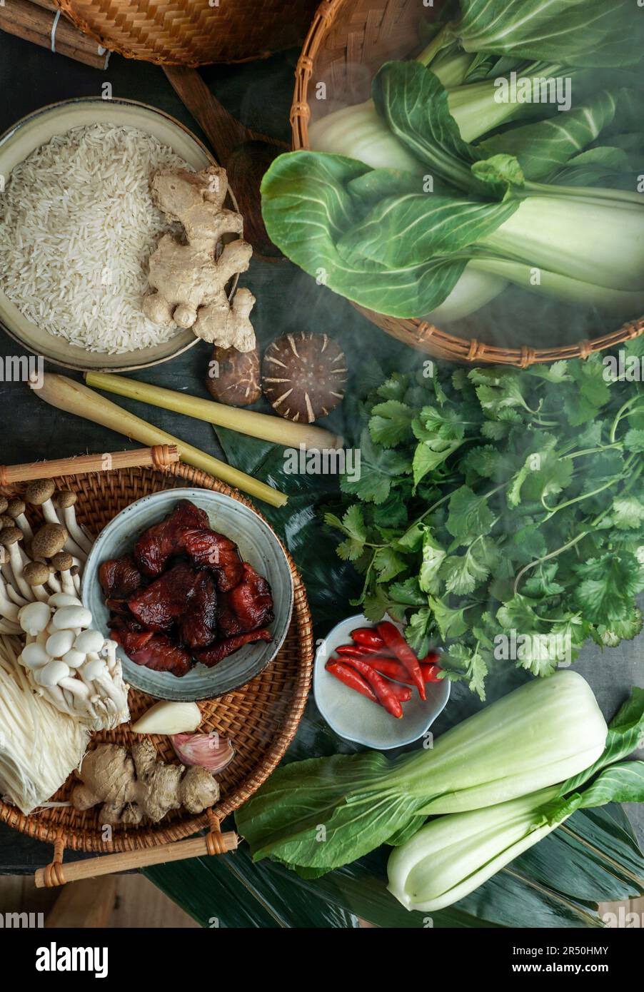 Ingredients for Asian cuisine in a bamboo steamer (rice, Asian