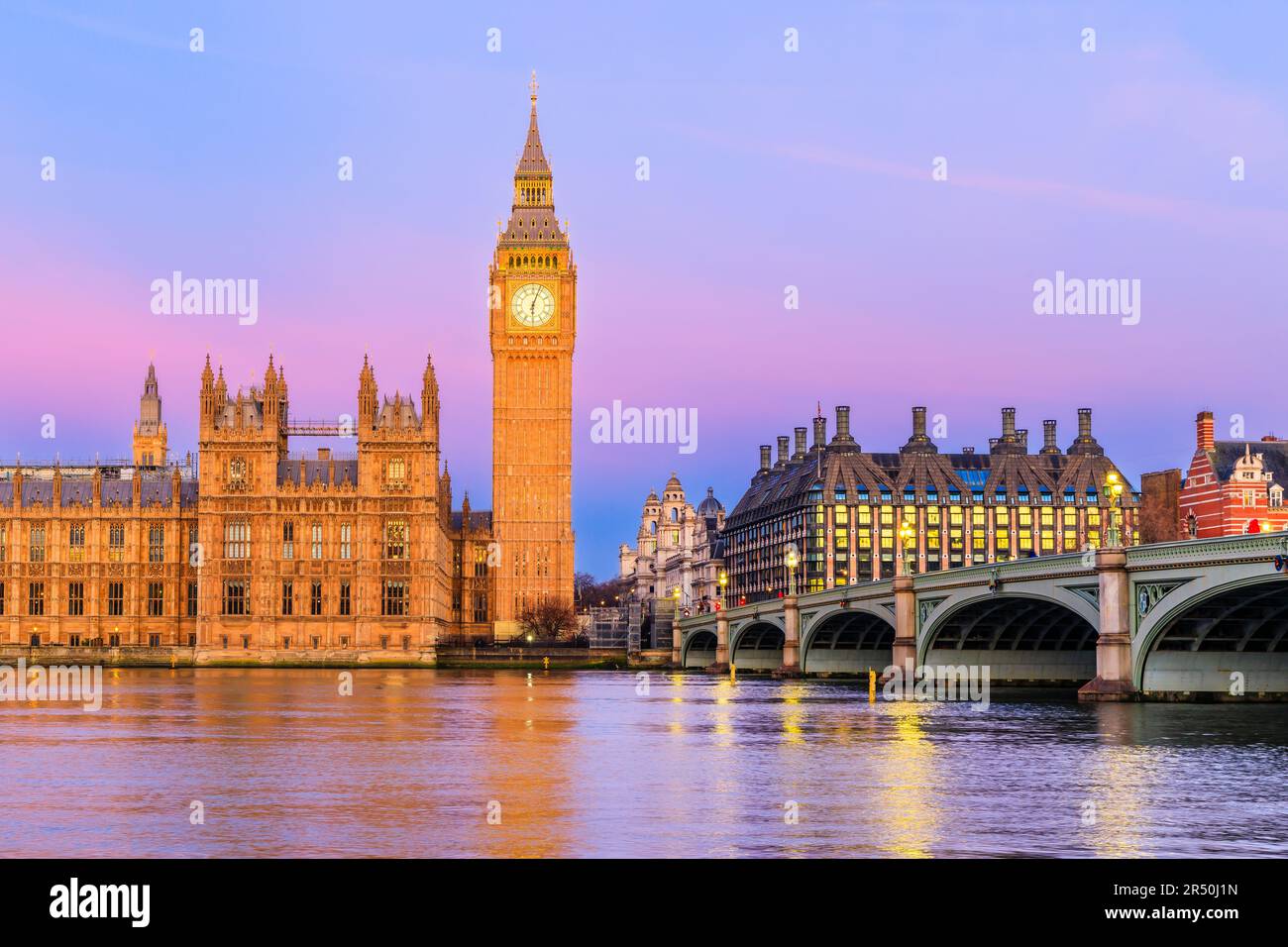 London, United Kingdom. The Palace of Westminster, Big Ben, and Westminster Bridge at sunrise. Stock Photo