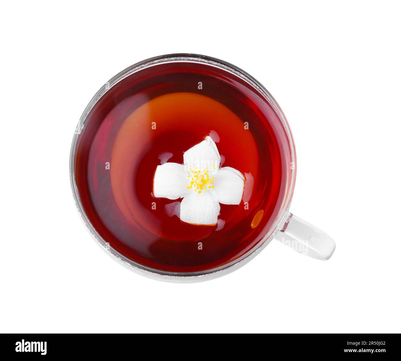 Cup of tea with fresh jasmine flower isolated on white, top view Stock