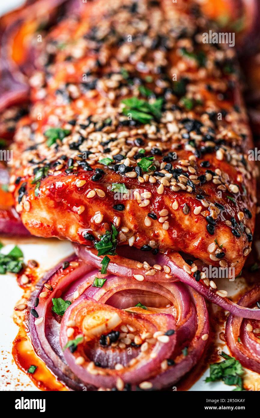 Asian salmon from the oven with sweet and spicy marinade and sesame seeds Stock Photo Alamy