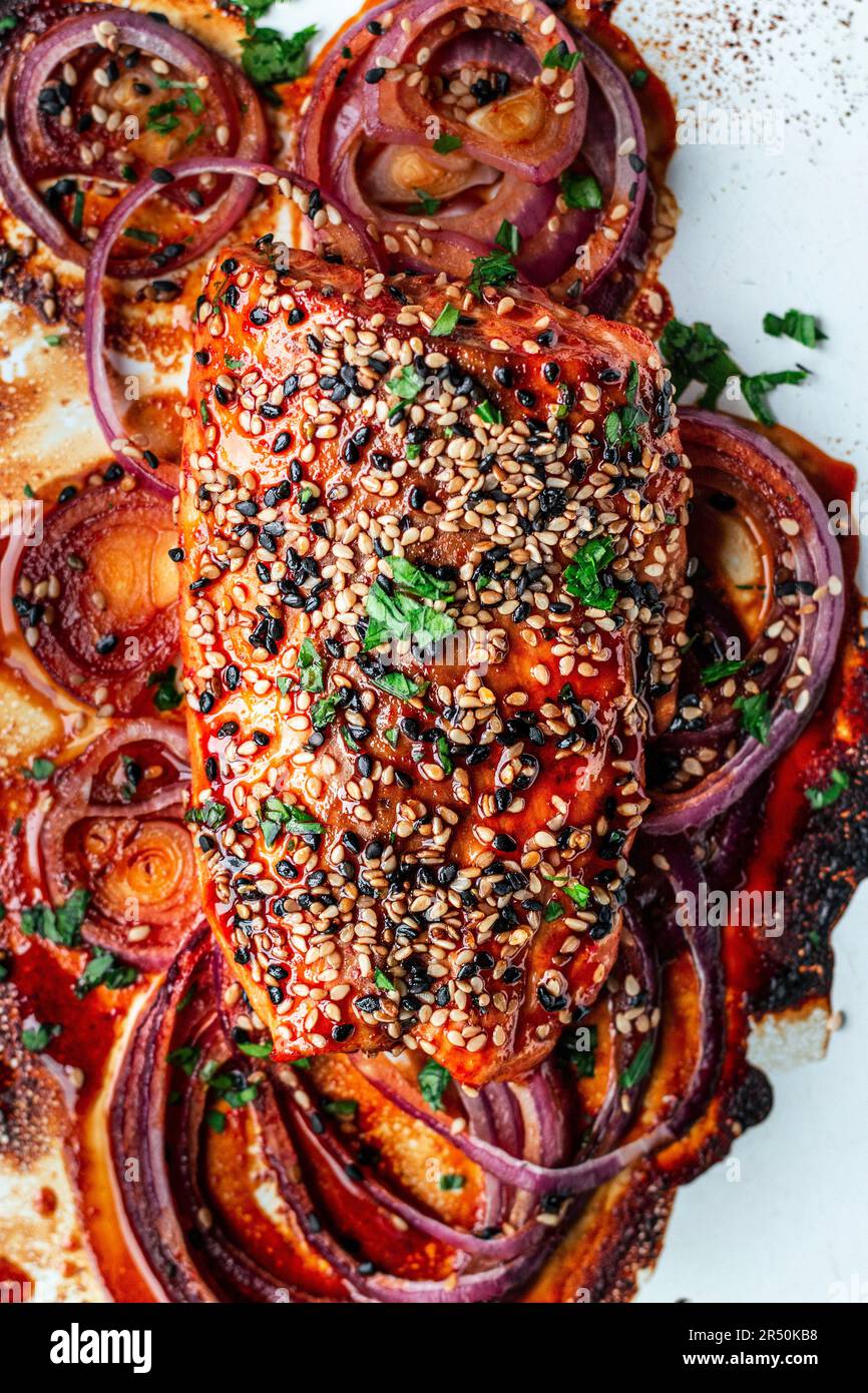 Asian salmon from the oven with sweet and spicy marinade and sesame seeds Stock Photo Alamy