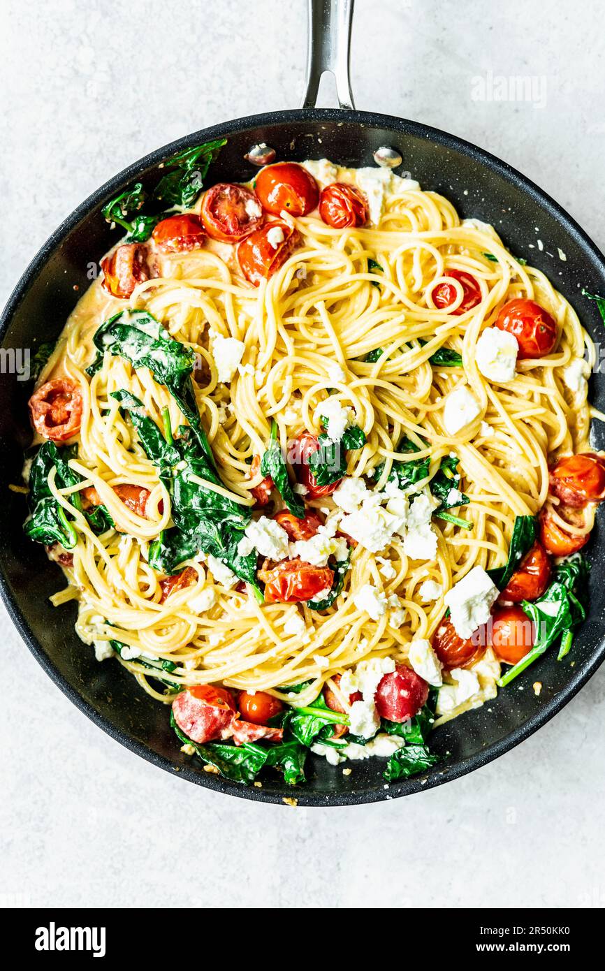 Simple spaghetti with spinach and feta Stock Photo Alamy