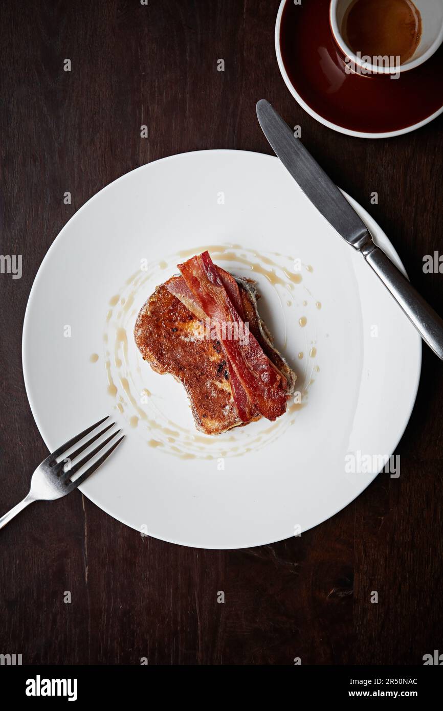 French toast with marple syrup and bacon Stock Photo - Alamy