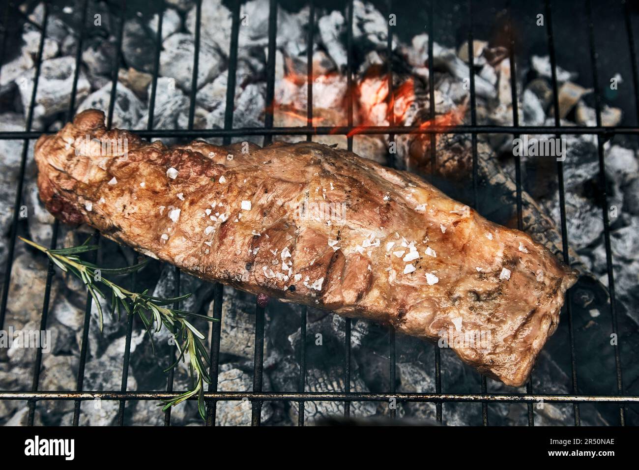 Beef on a charcoal grill Stock Photo - Alamy