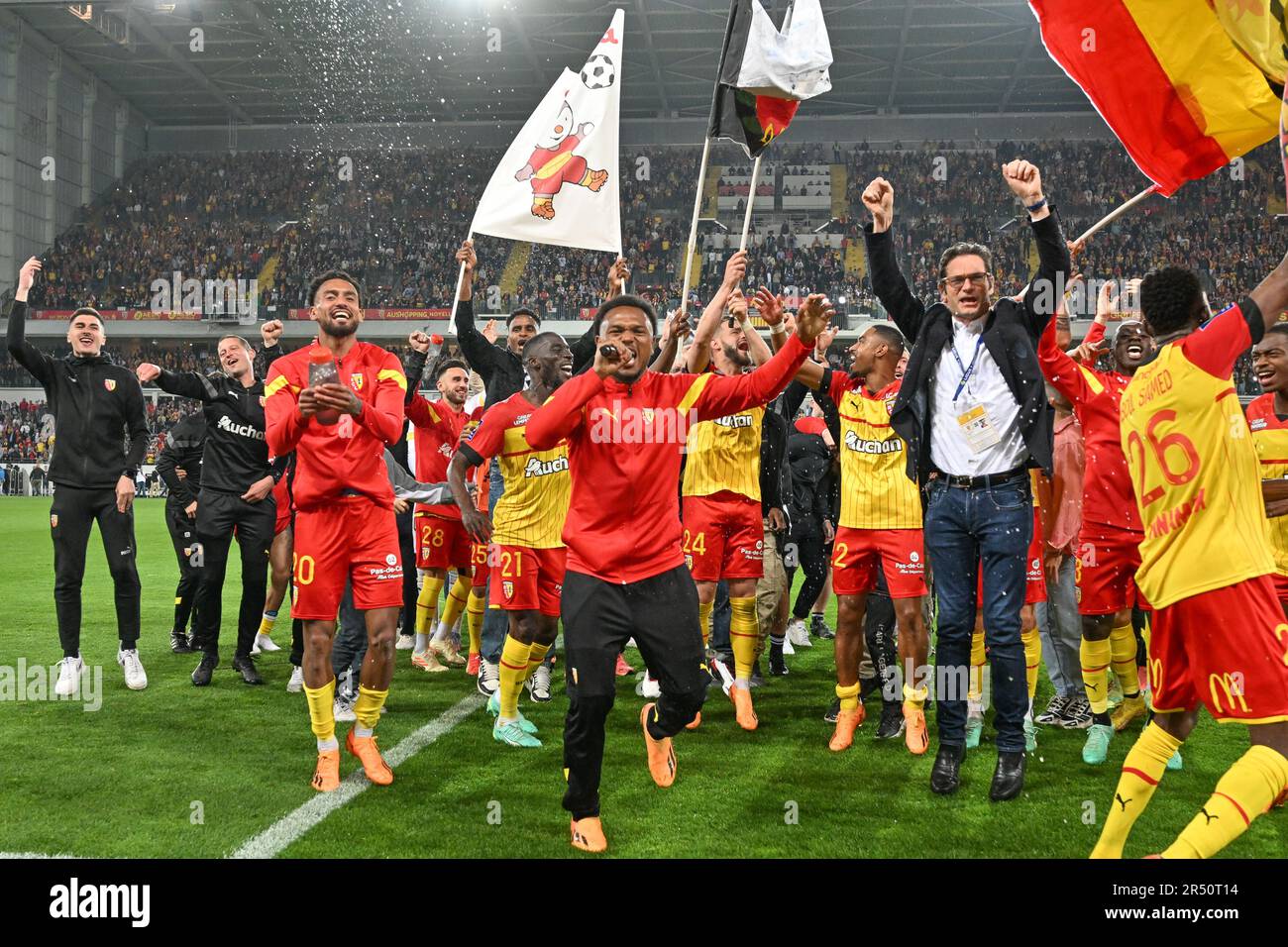 President Joseph Oughourlian of RC Lens pictured celebrating with his  players of RC Lens after winning a soccer game between t Racing Club de Lens  and AC Ajaccio, on the 37th matchday