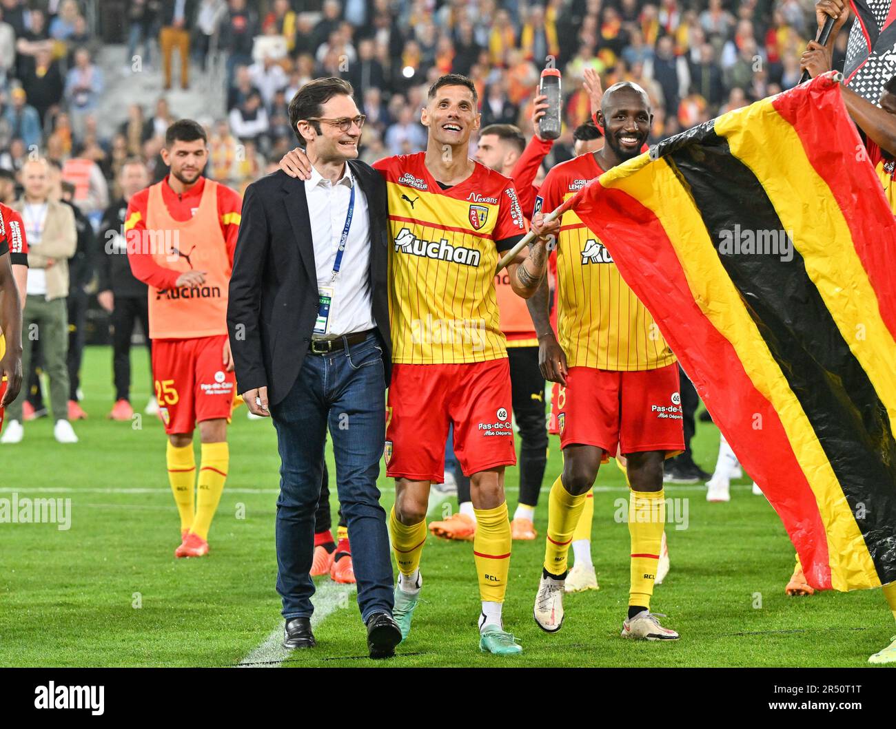 President Joseph Oughourlian of RC Lens pictured celebrating with Florian  Sotoca (7) of RC Lens and Seko Fofana (8) of RC Lens after winning a soccer  game between t Racing Club de