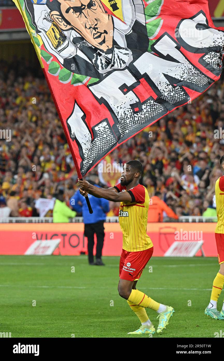 players of RC Lens and their president Joseph Oughourlian pictured  celebrating after winning and qualifying for the Champions League after a  soccer game between t Racing Club de Lens and AC Ajaccio