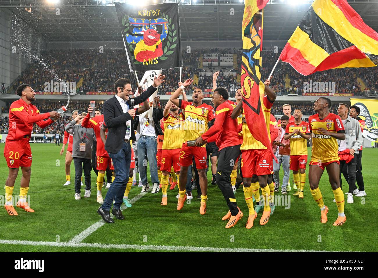 President Joseph Oughourlian of RC Lens pictured celebrating with his  players of RC Lens after winning a soccer game between t Racing Club de Lens  and AC Ajaccio, on the 37th matchday
