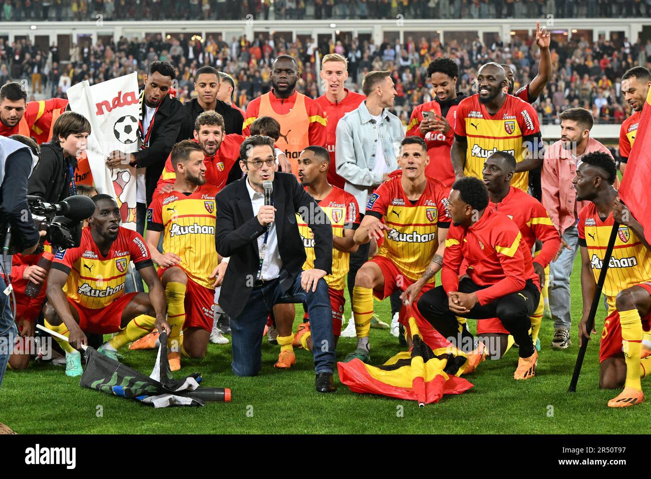 President Joseph Oughourlian of RC Lens pictured celebrating with his  players of RC Lens after winning a soccer game between t Racing Club de Lens  and AC Ajaccio, on the 37th matchday