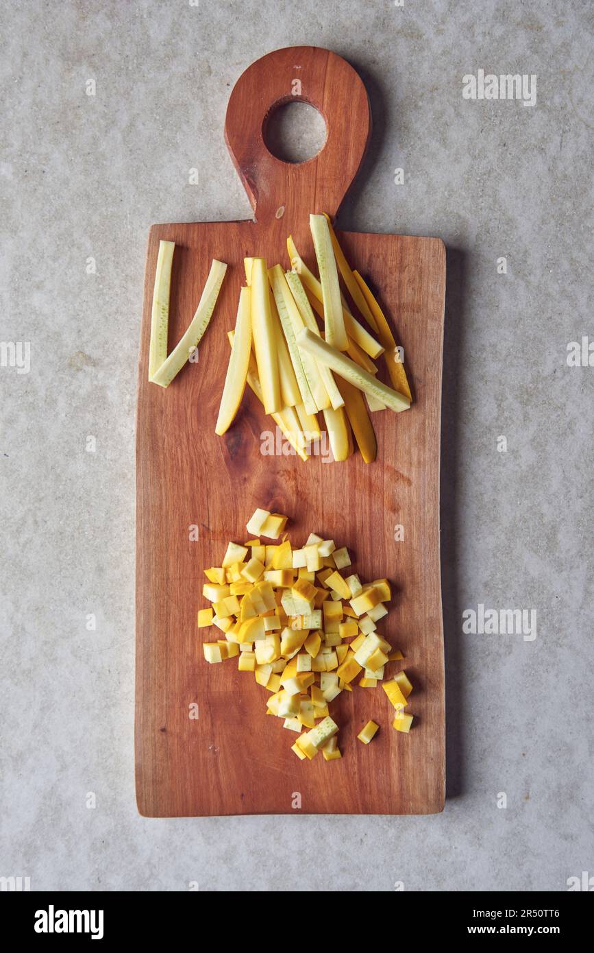 Zucchini cut into batons and cut into small cubes Stock Photo Alamy