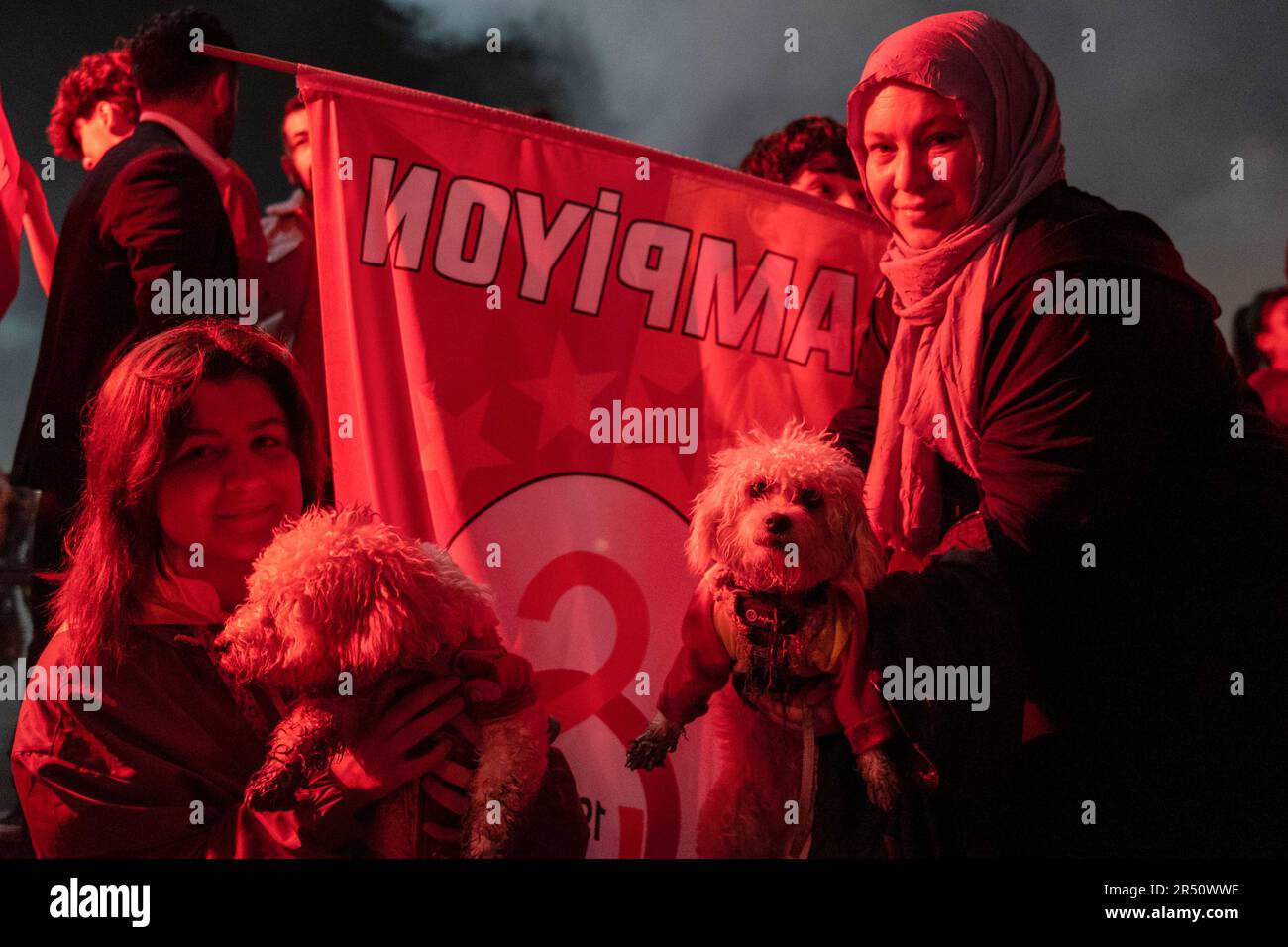 Ankara, Turkey. 31st May, 2023. A mother and daughter attended the championship celebrations with their dogs. Defeating MKE Ankaragucu 4-1 away in Spor Toto Super League, Galatasaray declared its championship 2 weeks before the end. The yellow-red team thus became the league champion for the 23rd time after 3 years. Reaching the championship in the 100th anniversary of the Republic of Turkey, the championship of Galatasaray was celebrated with enthusiasm in Turkey and in many parts of the world. Credit: SOPA Images Limited/Alamy Live News Stock Photo