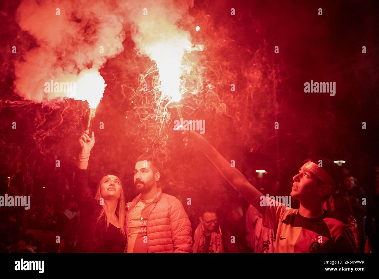 Ankara, Turkey. 31st May, 2023. Galatasaray fans light torches. Defeating MKE Ankaragucu 4-1 away in Spor Toto Super League, Galatasaray declared its championship 2 weeks before the end. The yellow-red team thus became the league champion for the 23rd time after 3 years. Reaching the championship in the 100th anniversary of the Republic of Turkey, the championship of Galatasaray was celebrated with enthusiasm in Turkey and in many parts of the world. Credit: SOPA Images Limited/Alamy Live News Stock Photo
