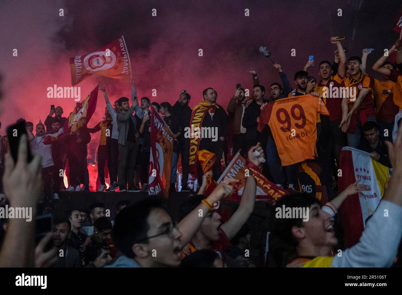 Ankara, Turkey. 30th May, 2023. Galatasaray fans sing championship songs. Defeating MKE Ankaragucu 4-1 away in Spor Toto Super League, Galatasaray declared its championship 2 weeks before the end. The yellow-red team thus became the league champion for the 23rd time after 3 years. Reaching the championship in the 100th anniversary of the Republic of Turkey, the championship of Galatasaray was celebrated with enthusiasm in Turkey and in many parts of the world. (Photo by Bilal Seckin/SOPA Images/Sipa USA) Credit: Sipa USA/Alamy Live News Stock Photo