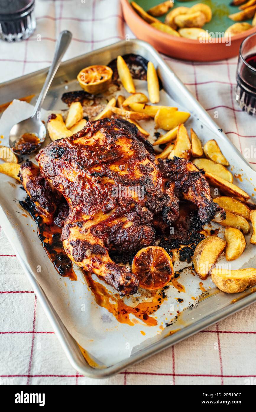 Butterflied fried chicken with Bloody Mary marinade Stock Photo Alamy