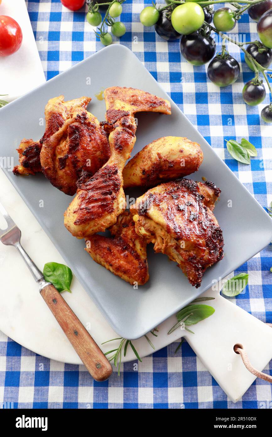 Grilled chicken drumsticks, thighs, and wings Stock Photo Alamy