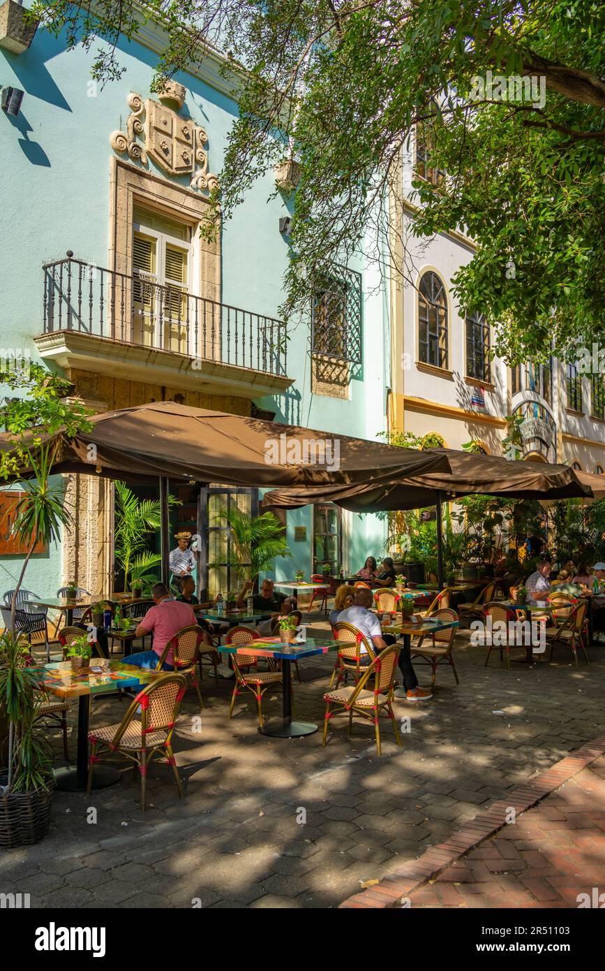 View of cafe and restaurant in Columbus Park, Santo Domingo, Dominican Republic, West Indies, Caribbean, Central America Stock Photo