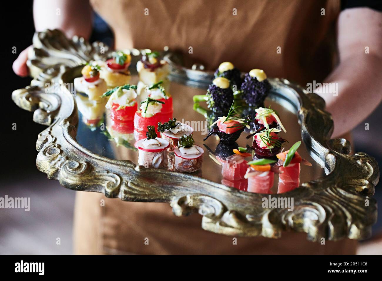 Canapees served on a mirror Stock Photo - Alamy
