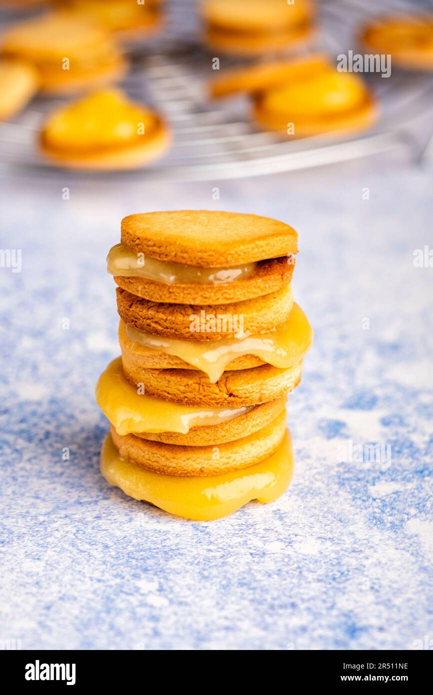 Sandwich cookies with lemon curd, stacked Stock Photo Alamy