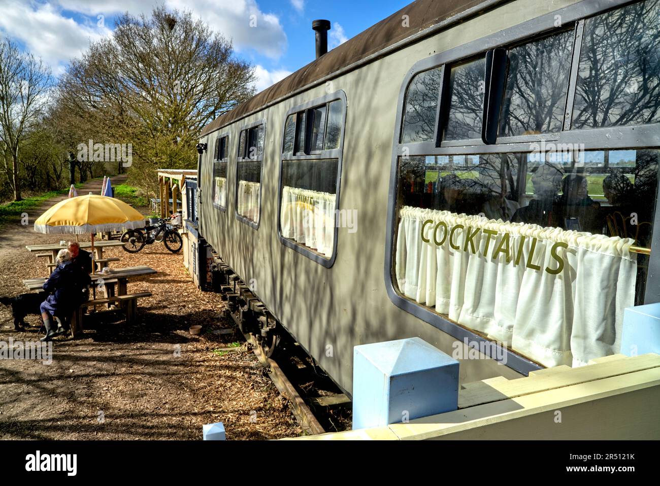 Unusual conversion of train carriages to a cafe and diner in a rural setting. England UK Stock Photo