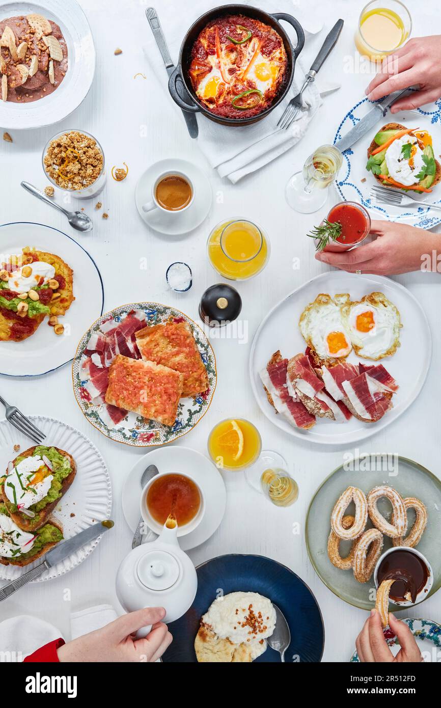 Richly set breakfast table Stock Photo