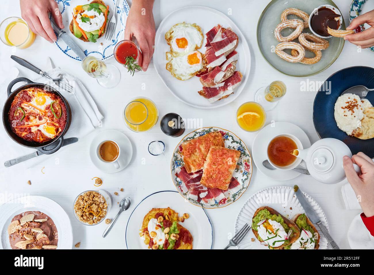 Richly set breakfast table Stock Photo