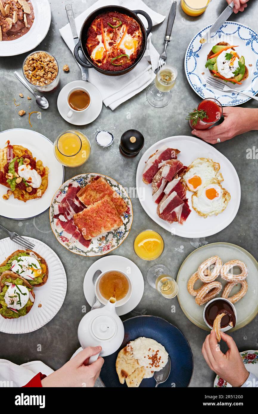 Richly set breakfast table Stock Photo