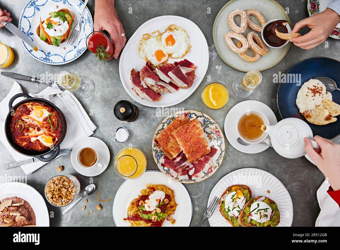 Richly set breakfast table Stock Photo
