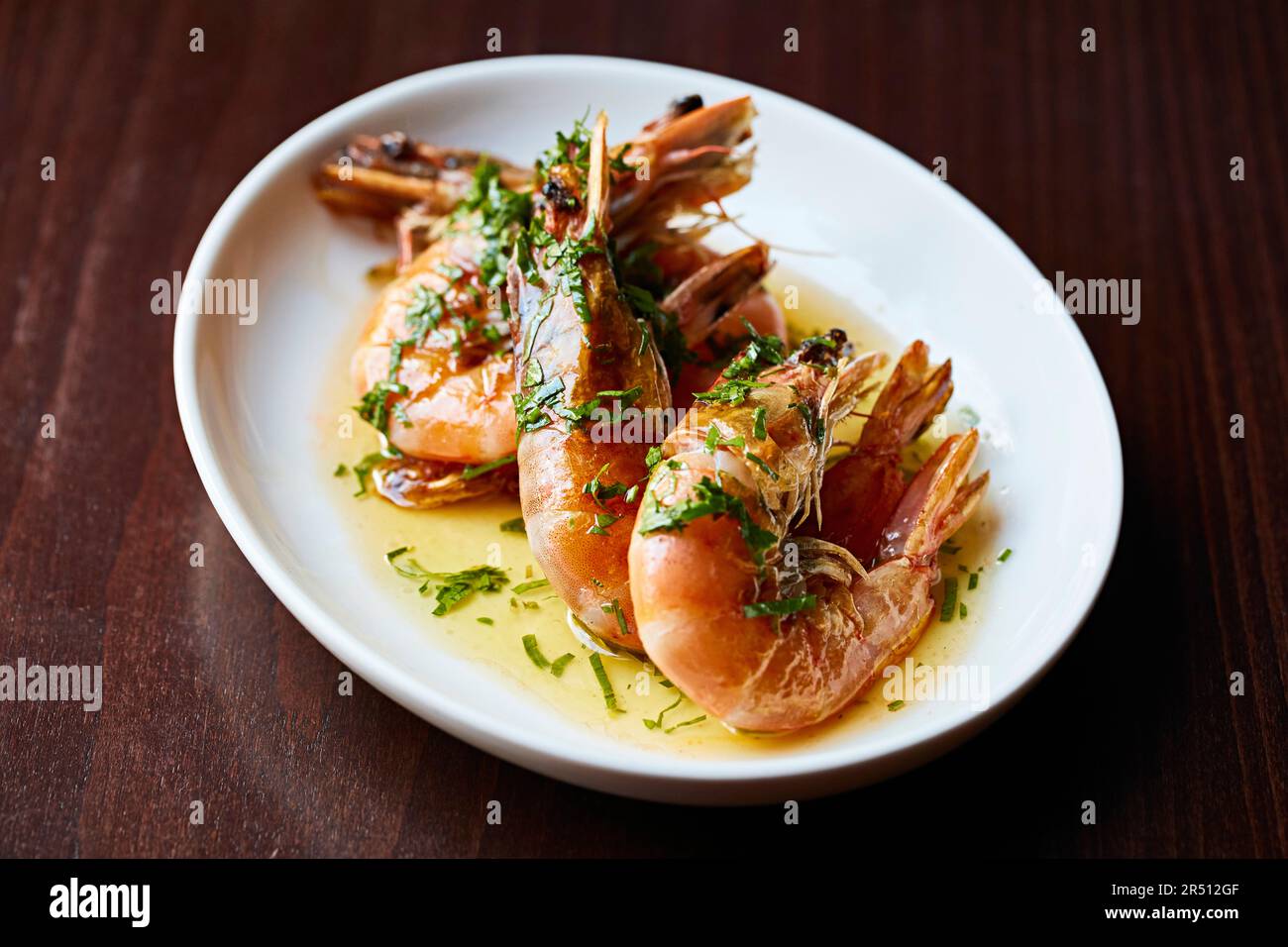 Prawns with garlic and parsley butter Stock Photo Alamy
