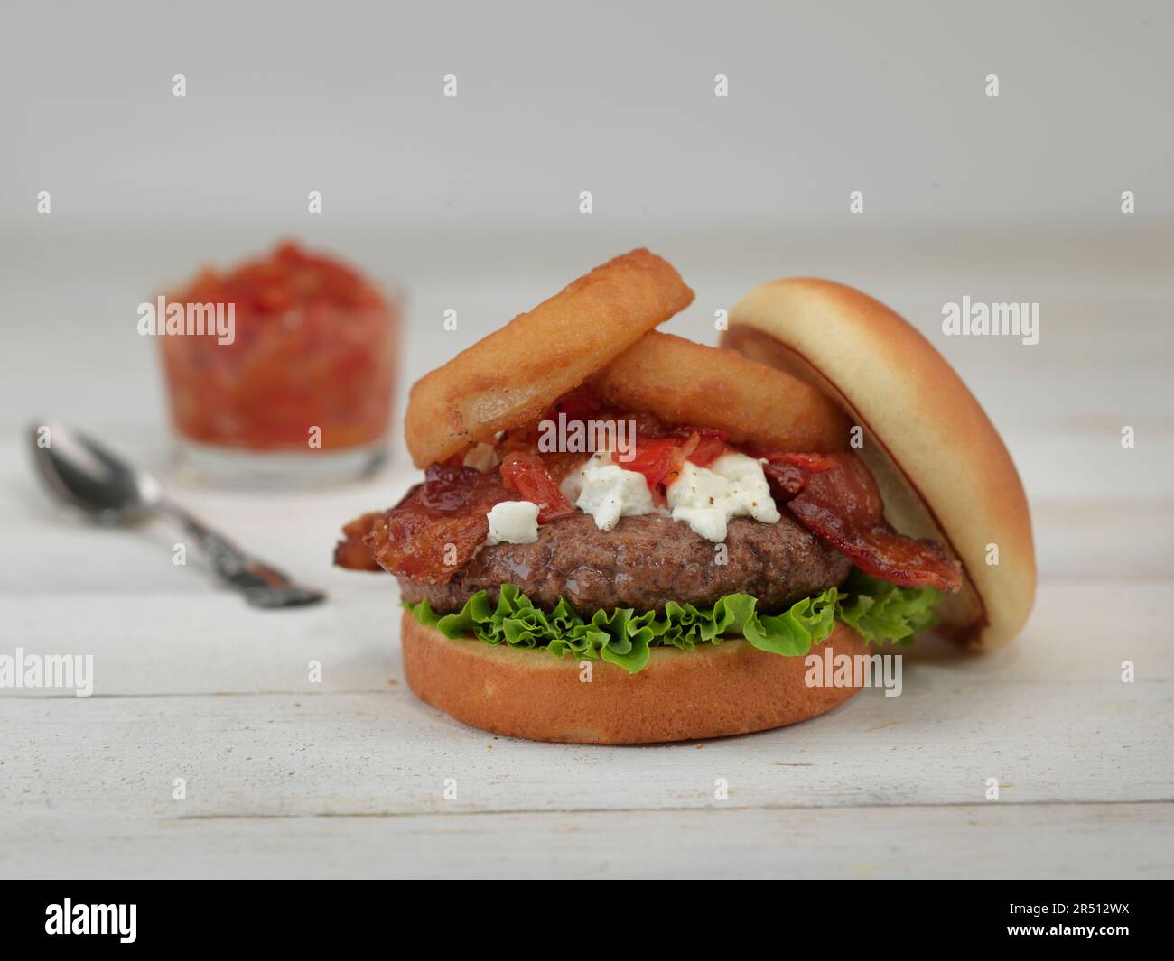 Burger with bacon and goat's cheese Stock Photo Alamy