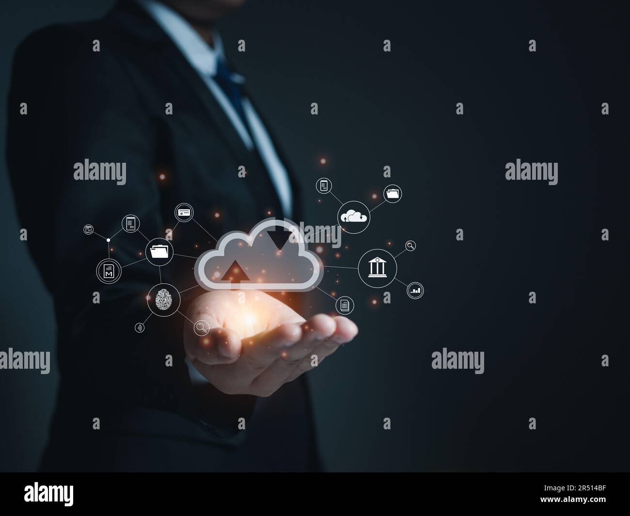 Businessman holding cloud icon. Cloud computing concept, connect communication equipment  information and technology with cloud computing. Stock Photo