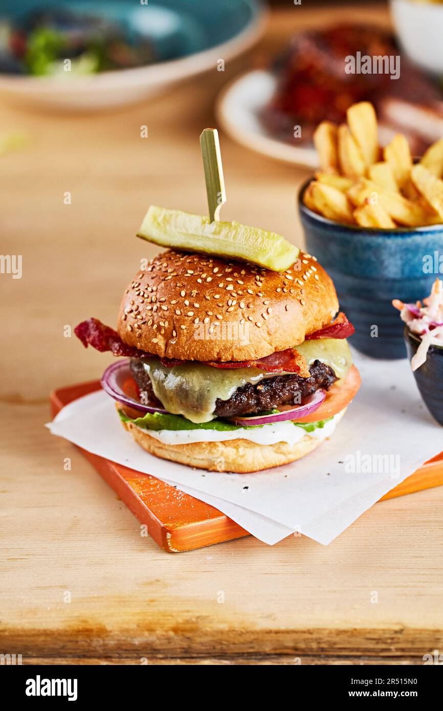Beef burger with bacon and cheese Stock Photo - Alamy
