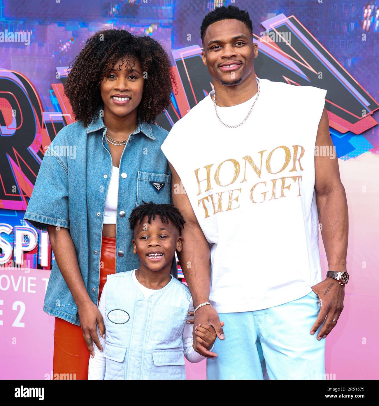 WESTWOOD, LOS ANGELES, CALIFORNIA, USA - MAY 30: Nina Earl, Noah Russell Westbrook and Russell Westbrook arrive at the World Premiere Of Sony Pictures Animation's 'Spider-Man: Across The Spider Verse' held at the Regency Village Theater on May 30, 2023 in Westwood, Los Angeles, California, United States. (Photo by Xavier Collin/Image Press Agency) Stock Photo