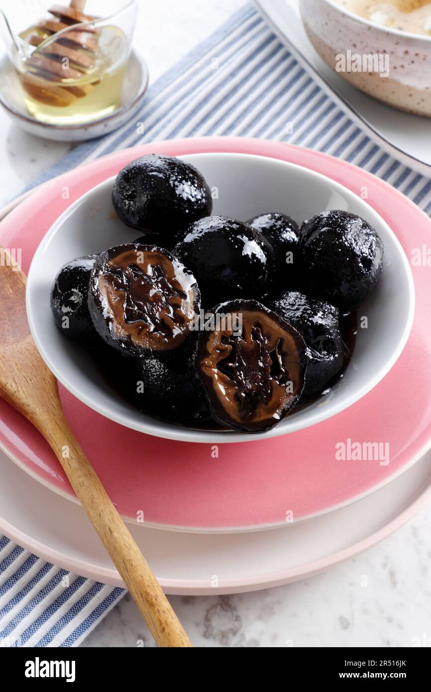 Green walnuts marinated in sweet syrup (Cyprus Stock Photo Alamy