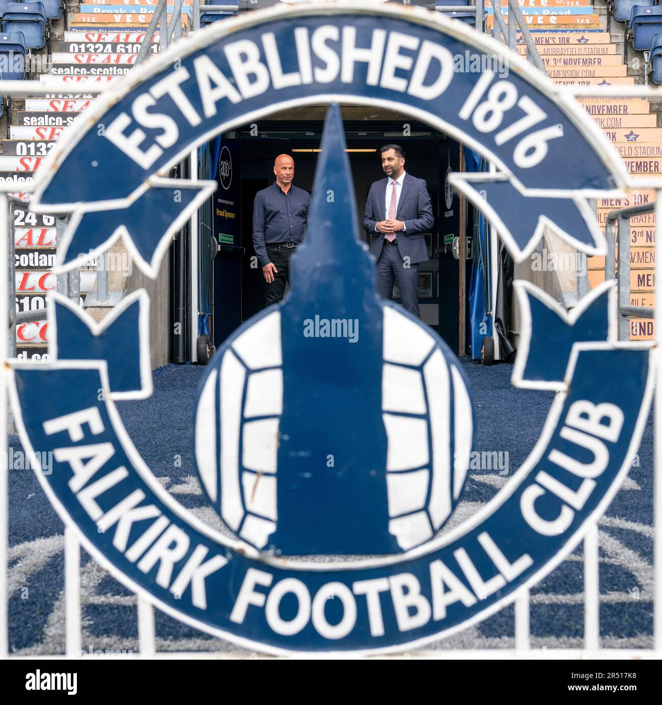 First Minister of Scotland Humza Yousaf (right) with Falkirk Supporters Society committee member
