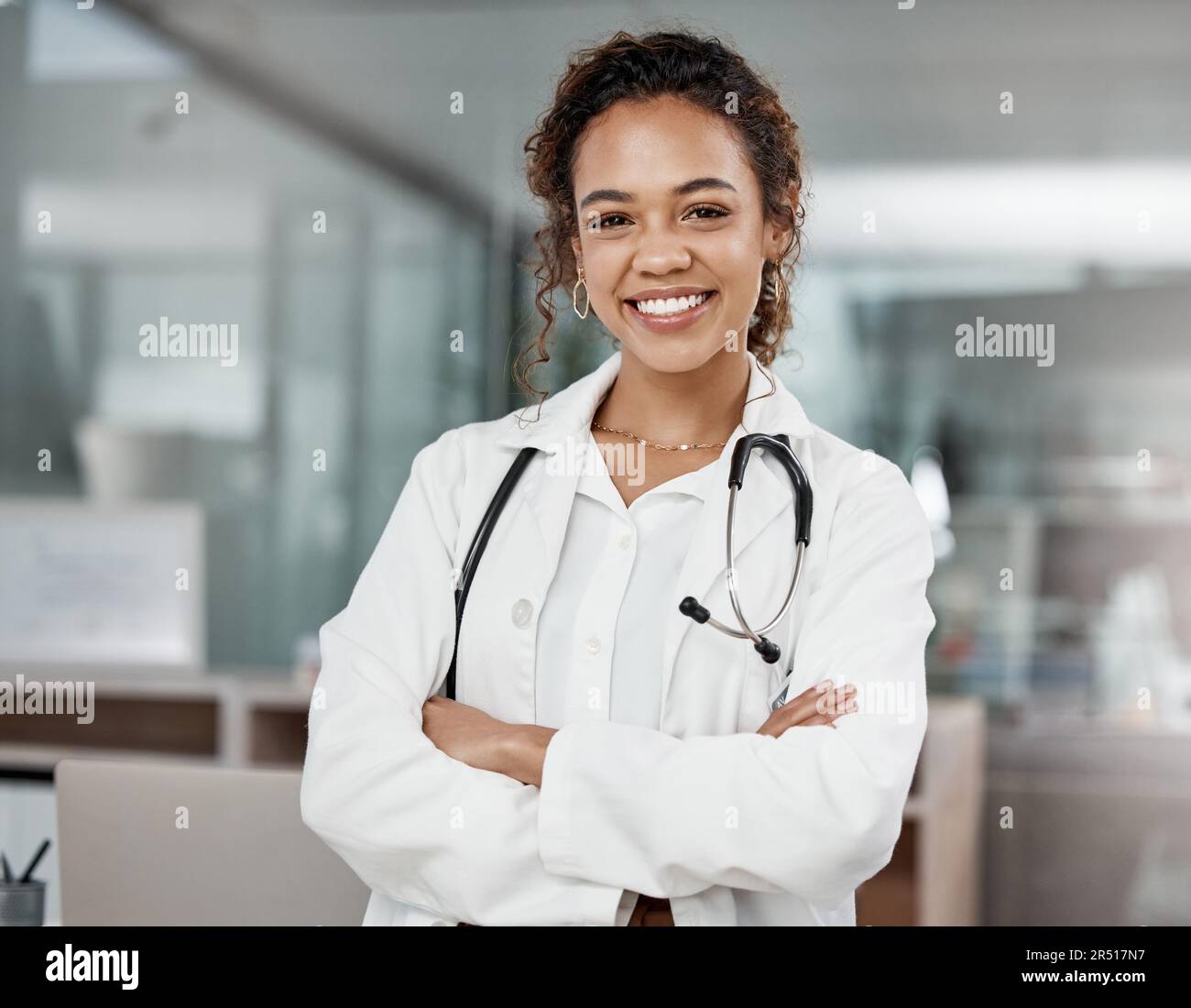 Healthcare, portrait of woman doctor with arms crossed and with ...