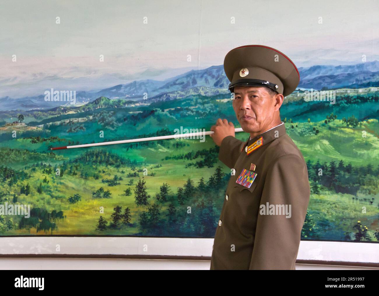 north korean orphans in an orphanage in front of the pictures of the leaders in north korea Stock Photo