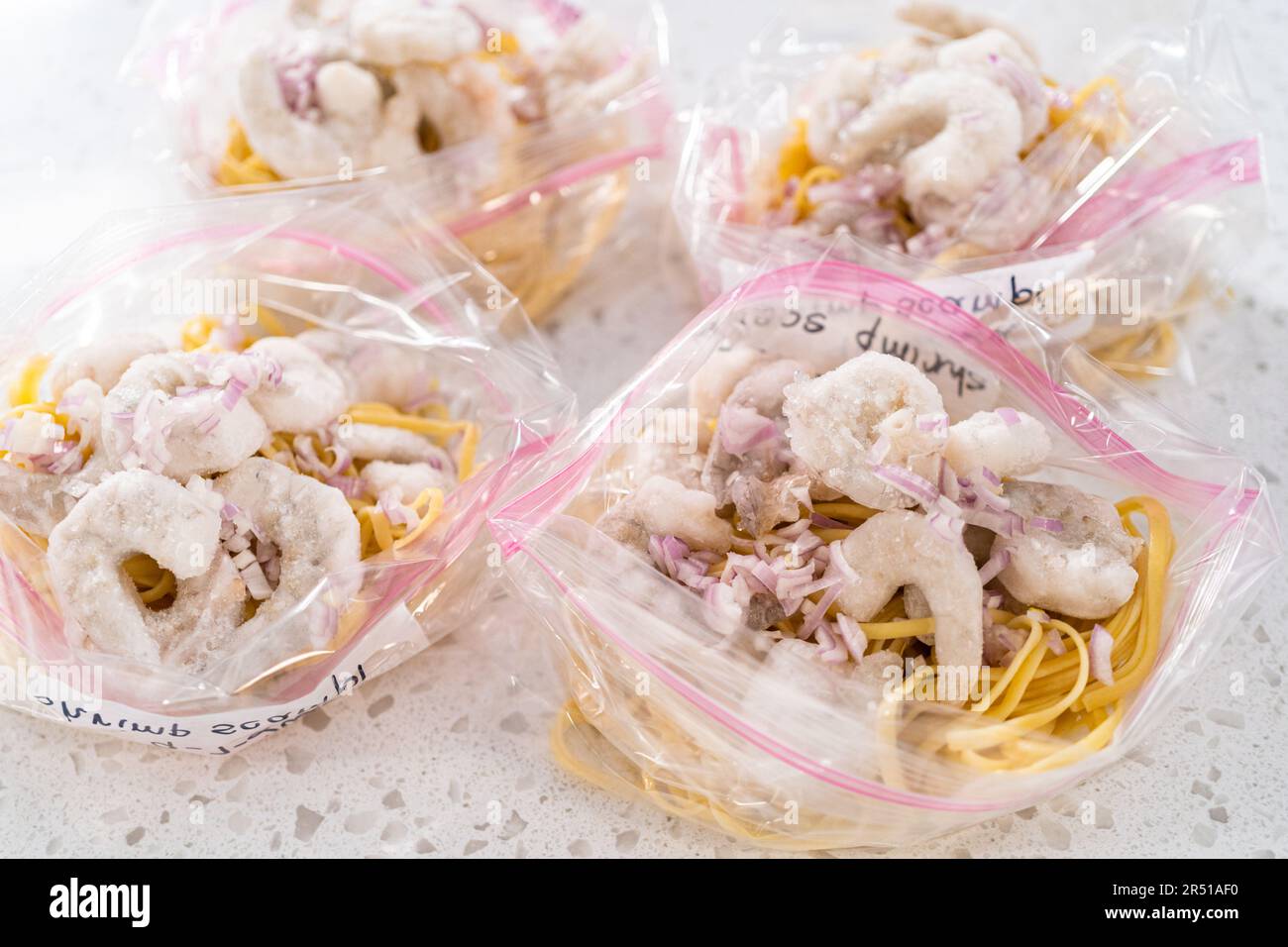 Frozen shrimp scampi meal prep Stock Photo - Alamy